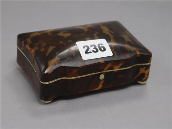 An early 20th century tortoiseshell and ivory casket length 11.5cm